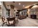 Spacious lounge area featuring stylish furnishings, abundant lighting, and a cozy atmosphere for relaxation and socializing at 2626 Peachtree Nw Rd # 412, Atlanta, GA 30305