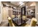 Meeting room featuring sleek table, modern chairs, and glass partitions, fostering a professional and collaborative environment at 2626 Peachtree Nw Rd # 412, Atlanta, GA 30305