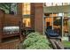 Outdoor seating with stainless grill near brick wall, offering a relaxing space at 2626 Peachtree Nw Rd # 412, Atlanta, GA 30305