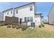 Backyard featuring a wooden deck, privacy fence, and lush green grass, great for outdoor living at 1433 Halpern Ln, Kennesaw, GA 30144