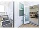 Relaxing balcony with a view of the bedroom, complete with wicker chairs and a bright, inviting atmosphere at 1433 Halpern Ln, Kennesaw, GA 30144