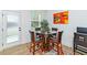 Bright breakfast nook featuring a glass top round table at 1433 Halpern Ln, Kennesaw, GA 30144