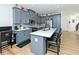 The open kitchen showcases a center island with bar stool seating at 1433 Halpern Ln, Kennesaw, GA 30144