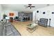 Spacious living area with an open floor plan, modern kitchen, and comfortable seating at 1433 Halpern Ln, Kennesaw, GA 30144