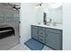 The main bathroom has double sinks and gray vanities at 1433 Halpern Ln, Kennesaw, GA 30144