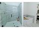 The luxurious main bathroom features a glass shower and soaking tub at 1433 Halpern Ln, Kennesaw, GA 30144