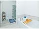 Bright main bathroom with soaking tub and tiled shower at 1433 Halpern Ln, Kennesaw, GA 30144