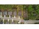 Aerial view of property highlighting lot size and proximity to wooded area at 164 Madison Grace Ave, Mcdonough, GA 30252