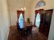 Inviting dining room with chandelier and ample seating space, ideal for Gathering gatherings at 204 Appalachee Church Rd, Auburn, GA 30011