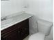 Bathroom vanity with a sink and a toilet at 3695 Church St, Clarkston, GA 30021
