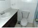 Bathroom vanity with a sink and a toilet at 3695 Church St, Clarkston, GA 30021