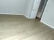 Bright bedroom features sleek floors and fresh paint at 3695 Church St, Clarkston, GA 30021