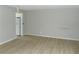 Spacious living room with hardwood floors and neutral walls at 3695 Church St, Clarkston, GA 30021
