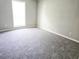 Spacious bedroom featuring plush carpet, neutral walls, and ample natural light at 4093 Chapel Mill Bnd, Decatur, GA 30034