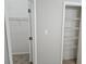 Pair of open closets with multiple shelves in a home at 4093 Chapel Mill Bnd, Decatur, GA 30034