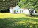 Charming one-story home features a well-maintained lawn and brick exterior at 4093 Chapel Mill Bnd, Decatur, GA 30034