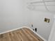 Laundry room shows updated wood-look flooring and new hookups at 4093 Chapel Mill Bnd, Decatur, GA 30034