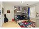 Bedroom features hardwood floors and twin loft bed with sports themed decorations at 5960 Sarah Orr Ln, Cumming, GA 30040