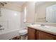 Bathroom featuring a toilet, tub and shower, and vanity with storage at 792 Russell Dr, Riverdale, GA 30296