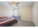 Bedroom featuring a ceiling fan and a hammock in the corner near a window at 792 Russell Dr, Riverdale, GA 30296