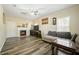 Cozy living room with fireplace and laminate flooring provides comfortable atmosphere at 792 Russell Dr, Riverdale, GA 30296