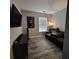 Comfortable bedroom featuring stylish flooring, bright windows, modern decor, ample space, and a cozy atmosphere at 1503 Korona Ct, Woodstock, GA 30188