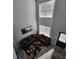 Bright and airy living area with two-story windows, modern furnishings, stylish decor, and cohesive color scheme at 1503 Korona Ct, Woodstock, GA 30188