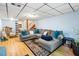 Spacious basement lounge area featuring a large sectional sofa and stylish decor at 2425 Shiloh Sw Dr, Marietta, GA 30064