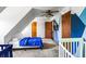 Bright bedroom with mountain mural, ceiling fan, and space for beds and cribs at 2425 Shiloh Sw Dr, Marietta, GA 30064