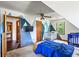 Unique bedroom features a mountain mural, crib, and vibrant blue bedding offering a playful and creative space at 2425 Shiloh Sw Dr, Marietta, GA 30064