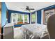 Inviting bedroom with bay window, showcasing a bright, relaxing space with ample natural light and soft white carpet at 2425 Shiloh Sw Dr, Marietta, GA 30064