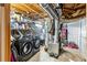 Laundry room with modern front-load washer and dryer with exposed HVAC ductwork at 2425 Shiloh Sw Dr, Marietta, GA 30064