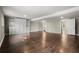 Large basement with built in cabinet and wood floors at 250 Martin Ridge Ct, Roswell, GA 30076