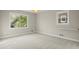 Bedroom featuring carpet, a large window and light gray paint at 250 Martin Ridge Ct, Roswell, GA 30076