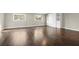 Bedroom features wood floors and built in cabinet at 250 Martin Ridge Ct, Roswell, GA 30076