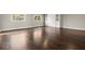 Bedroom features wood floors and built in cabinet at 250 Martin Ridge Ct, Roswell, GA 30076