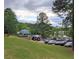 Community event by the lake, featuring parking, restaurant and outdoor seating at 250 Martin Ridge Ct, Roswell, GA 30076