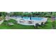Community pool with ample seating, lounge chairs, and umbrellas for relaxation at 250 Martin Ridge Ct, Roswell, GA 30076