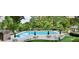 Community pool area featuring ample seating, lounge chairs, and umbrellas for a relaxing experience at 250 Martin Ridge Ct, Roswell, GA 30076