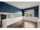 Bright dining room with large window offering views and modern light fixture at 250 Martin Ridge Ct, Roswell, GA 30076