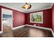 Dining room offers hardwood floors, contemporary lighting, and bright red paint at 250 Martin Ridge Ct, Roswell, GA 30076