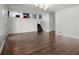 Living room showing hardwood floors and access to the upper level at 250 Martin Ridge Ct, Roswell, GA 30076