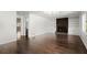 Spacious living room with fireplace, hardwood flooring, and built in shelving at 250 Martin Ridge Ct, Roswell, GA 30076