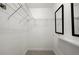 Empty walk-in closet with metal shelving, carpeted floor, and full length mirrors at 250 Martin Ridge Ct, Roswell, GA 30076