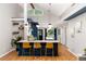 Modern kitchen with a large island, barstool seating, sleek appliances, and open layout at 3063 Leafwood Dr, Decatur, GA 30033