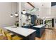 Modern kitchen with stainless steel appliances, sleek cabinetry, and two white countertop islands at 3063 Leafwood Dr, Decatur, GA 30033