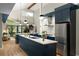 Modern kitchen with stainless steel appliances, sleek cabinetry, white countertop and hardwood floors at 3063 Leafwood Dr, Decatur, GA 30033