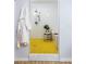 Modern tiled shower featuring a striking yellow floor, sleek fixtures, and minimalist design at 3063 Leafwood Dr, Decatur, GA 30033