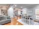Cozy dining and living area with hardwood floors, natural light, and stylish decor at 3642 Falls Trl, Winston, GA 30187