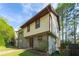 Charming two-story home features a unique stone facade and neutral siding, creating a cozy curb appeal at 1248 Falling Water Se Dr, Smyrna, GA 30080